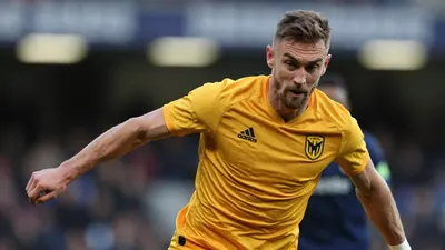Stephen O'Donnell competes with Brad Spencer in a licensable match photo from Motherwell's 2026 Premiership fixture away...